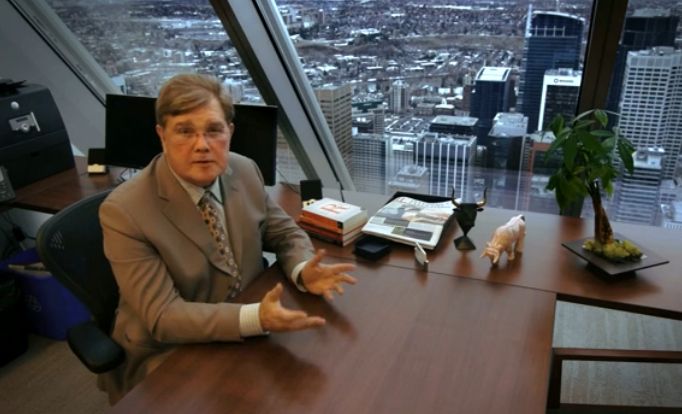 Ken MacNeal at a desk.